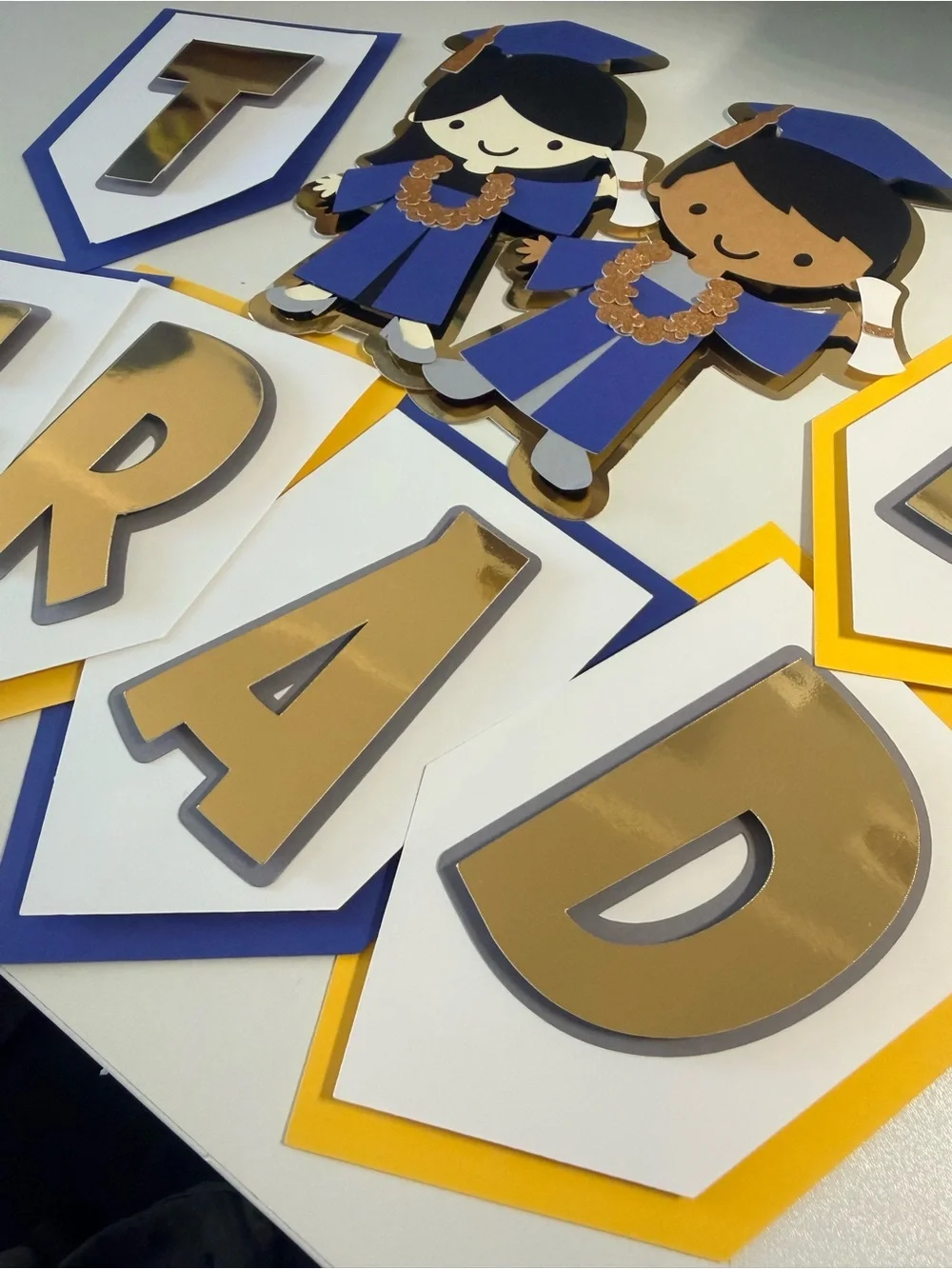 NueSol Creative festive graduation